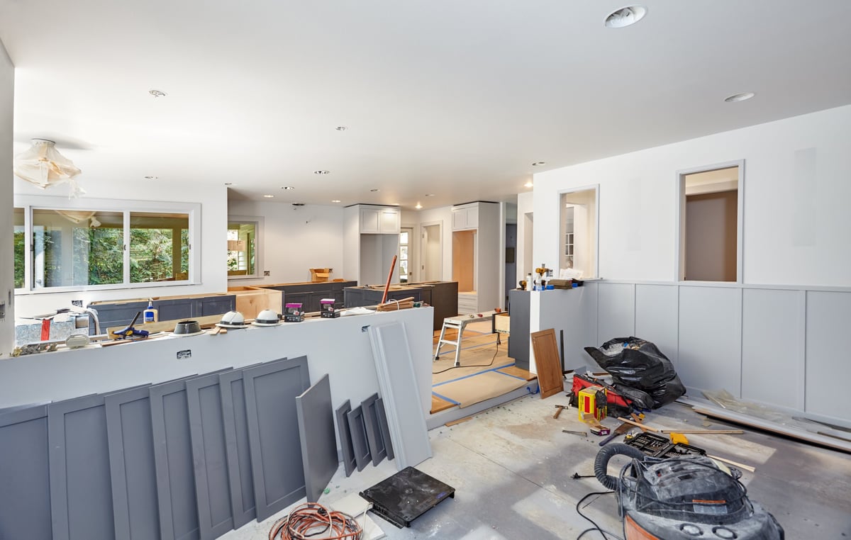 Painted cabinet doors and shelving during a kitchen remodel